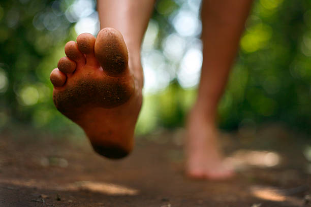 Barefoot Running Transition Plan: barefoot running in the forest.